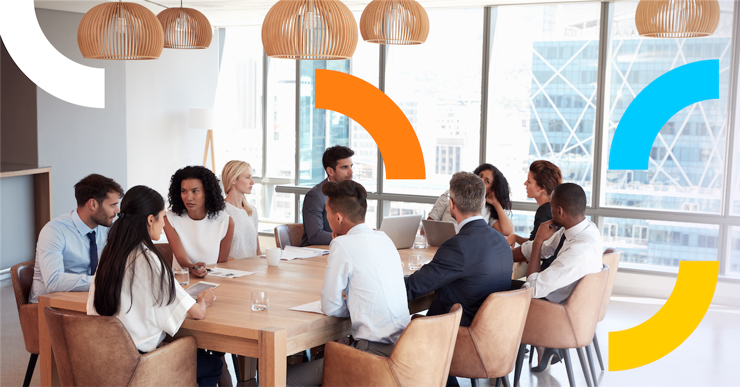 a group of people sitting around a table