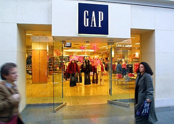 a person standing in front of a storefront