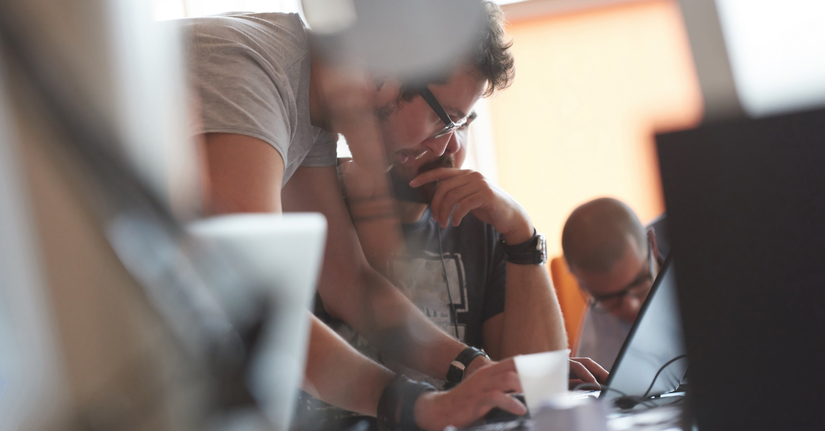 a person looking at a computer screen